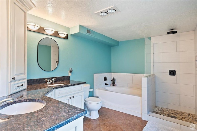 5925 W Highland Dr N, Mountain Green, UT 84050 - full bath with a textured ceiling, a garden tub, tiled shower, vanity, and toilet
