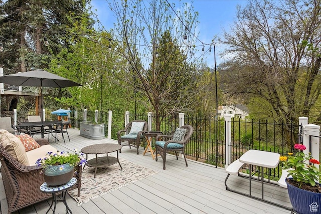 5925 W Highland Dr N, Mountain Green, UT 84050 - wooden terrace with outdoor dining area