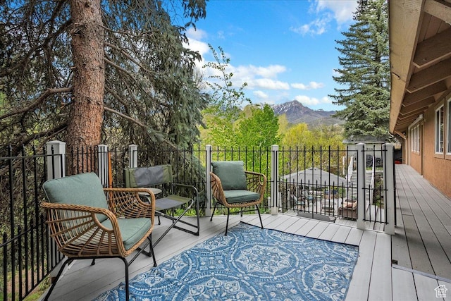 5925 W Highland Dr N, Mountain Green, UT 84050 - deck with a mountain view