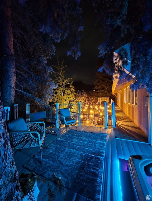 5925 W Highland Dr N, Mountain Green, UT 84050 - patio at twilight with a deck