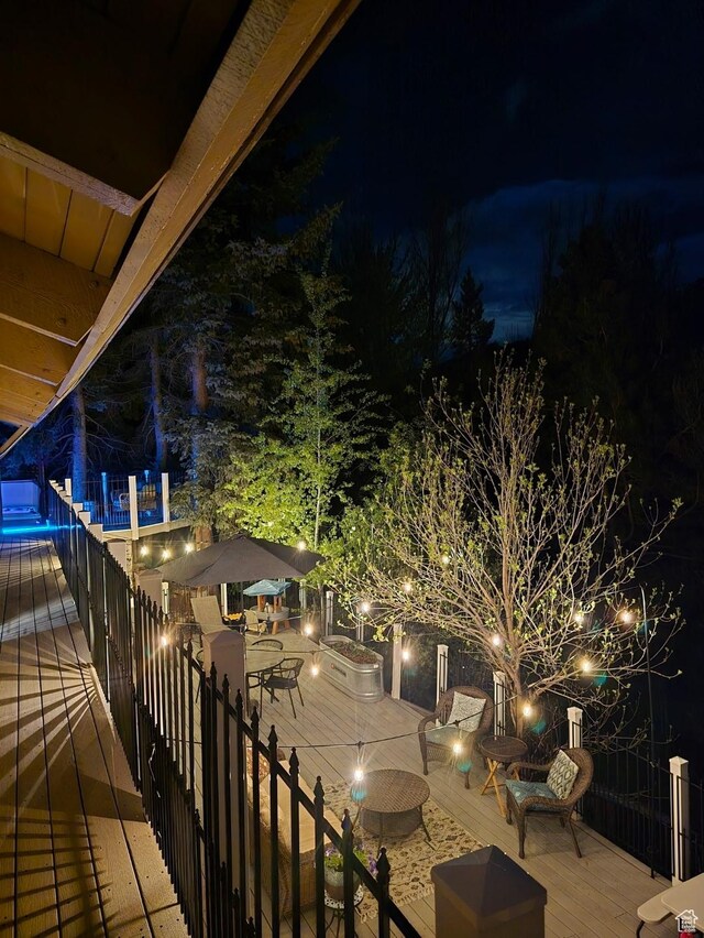 5925 W Highland Dr N, Mountain Green, UT 84050 - view of wooden balcony with a deck