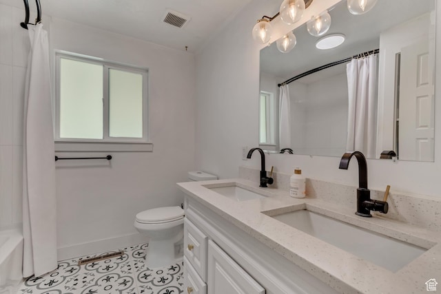 172 E 400 N, Tooele, UT 84074 - full bath featuring toilet, tile patterned flooring, baseboards, and double vanity