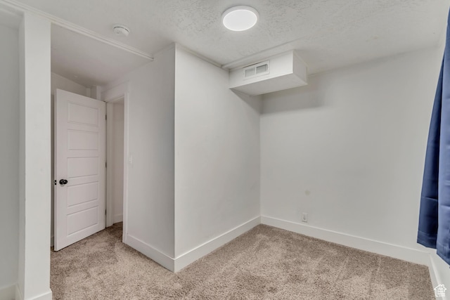 172 E 400 N, Tooele, UT 84074 - finished basement with light carpet, baseboards, and a textured ceiling