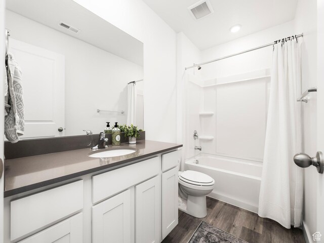 944 E Jack Dr, Saratoga Springs, UT 84045 - full bathroom featuring wood finished floors, toilet, vanity, and shower / tub combo