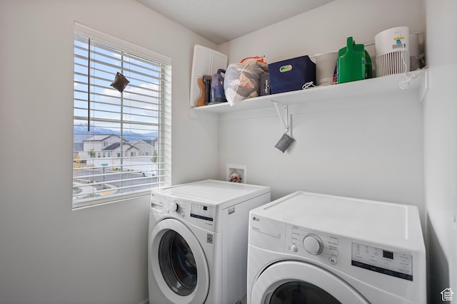 laundry room featuring independent washer and dryer