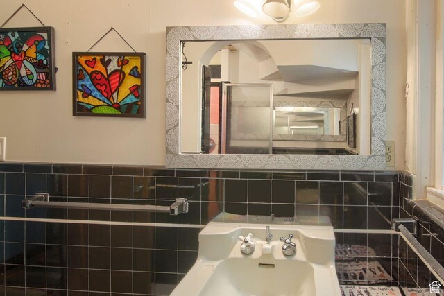 bathroom featuring a shower stall