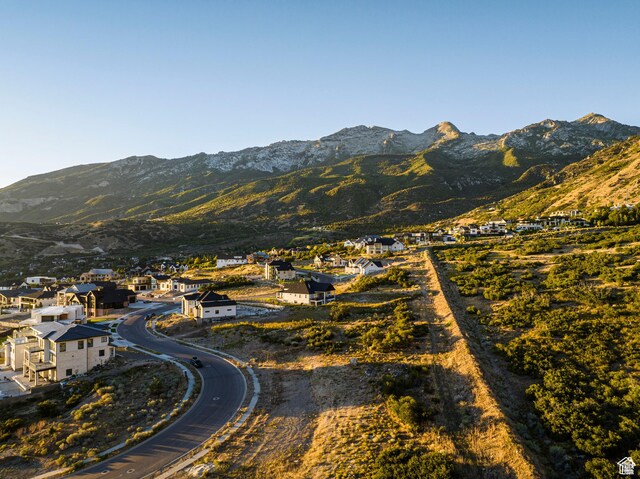 view of mountain backdrop with nearby suburban area