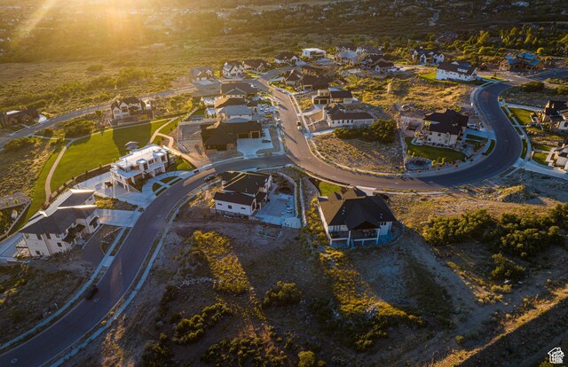 aerial view of property's location with nearby suburban area