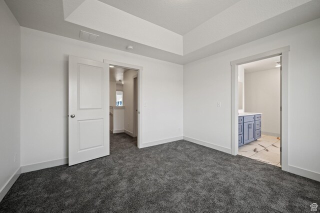 621 S 85 E Unit 24, Smithfield, UT 84335 - unfurnished bedroom with carpet, baseboards, and ensuite bathroom