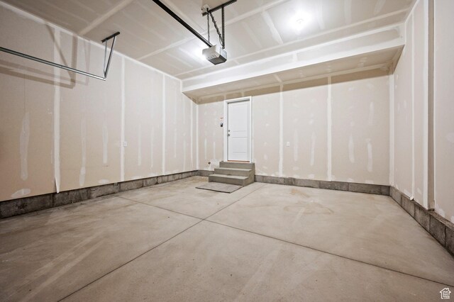 621 S 85 E Unit 24, Smithfield, UT 84335 - garage featuring a garage door opener