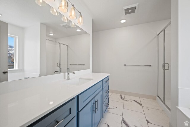 621 S 85 E Unit 24, Smithfield, UT 84335 - full bathroom with marble finish flooring, a shower stall, vanity, baseboards, and recessed lighting