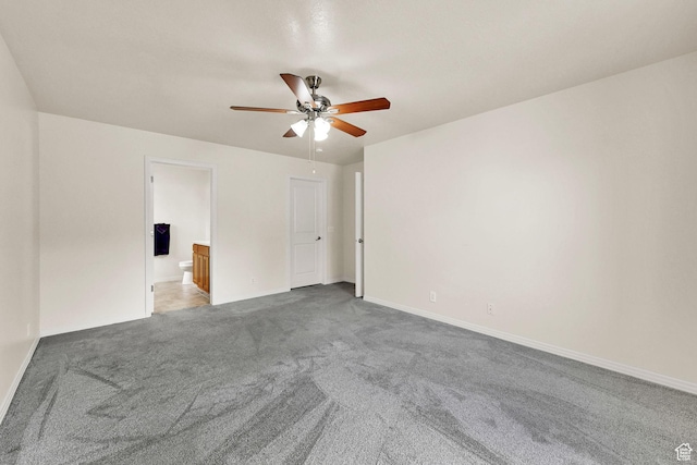 157 W Southwell St, Ogden, UT 84404 - spare room with carpet floors, a ceiling fan, and baseboards