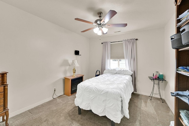 157 W Southwell St, Ogden, UT 84404 - bedroom with light colored carpet, baseboards, and a ceiling fan