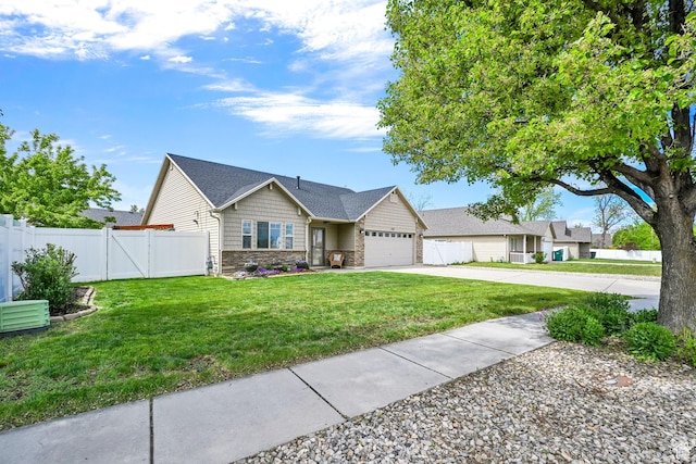 157 W Southwell St, Ogden, UT 84404 - ranch-style home featuring stone siding, an attached garage, driveway, and a gate