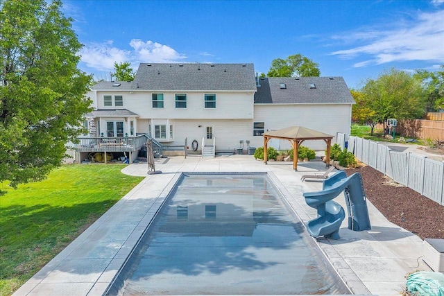 back of property featuring a gazebo, a wooden deck, and a patio area