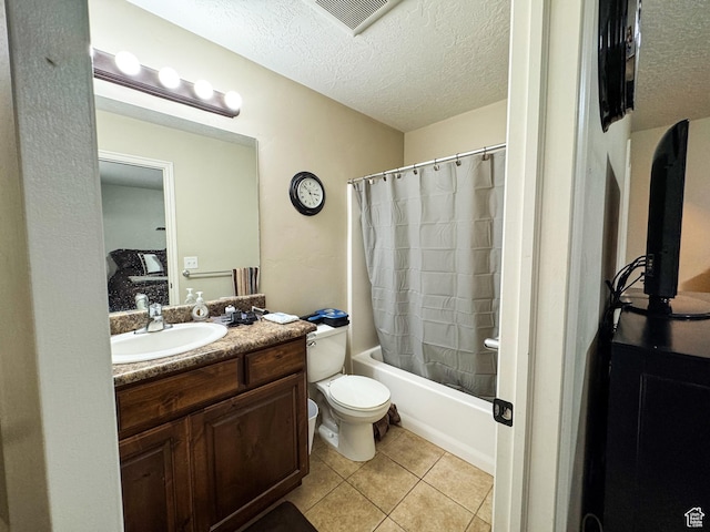 1661 S 1960 E, Spanish Fork, UT 84660 - full bathroom with tile patterned flooring, vanity, toilet, a textured ceiling, and shower / bath combo