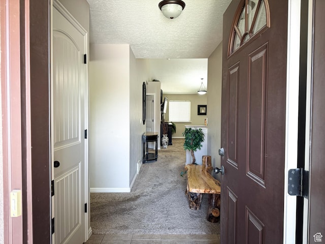 1661 S 1960 E, Spanish Fork, UT 84660 - carpeted foyer entrance with baseboards, a textured ceiling, and tile patterned flooring
