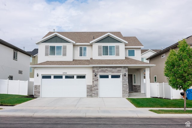 14944 S Beckham Dr W, Herriman, UT 84096 - craftsman house with an attached garage, fence, stone siding, and concrete driveway