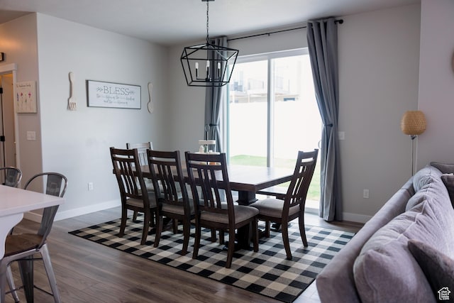 14944 S Beckham Dr W, Herriman, UT 84096 - dining space with a chandelier, dark wood-style floors, and baseboards