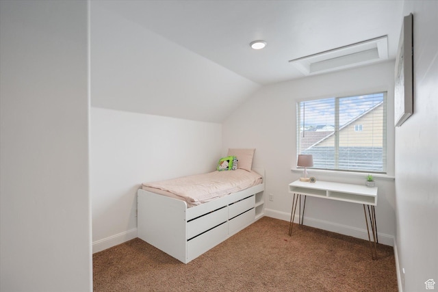bedroom featuring light carpet, vaulted ceiling, baseboards, and attic access