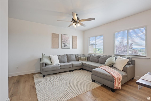 61 N Peach St, Santaquin, UT 84655 - living area with ceiling fan, wood finished floors, and baseboards