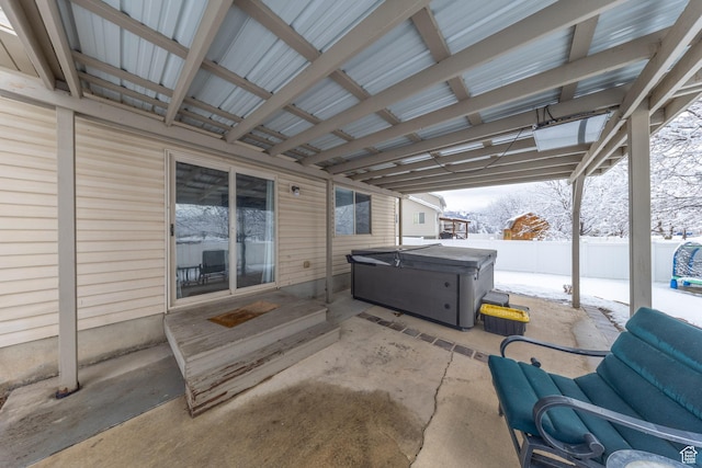 1501 W 2060 S, Woods Cross, UT 84087 - snow covered patio featuring a hot tub and fence