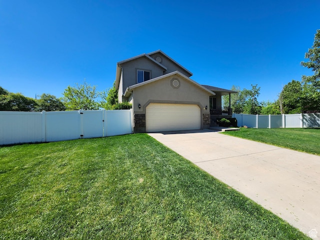 1501 W 2060 S, Woods Cross, UT 84087 - view of front of house featuring driveway, stucco siding, an attached garage, stone siding, and a gate
