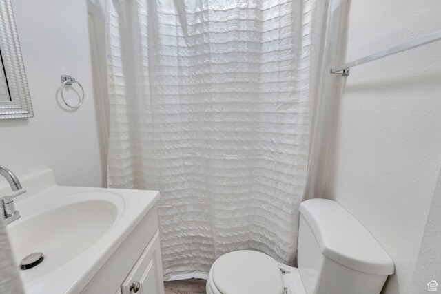 358 W 400 S, Provo, UT 84601 - full bathroom featuring toilet, vanity, and a shower with curtain