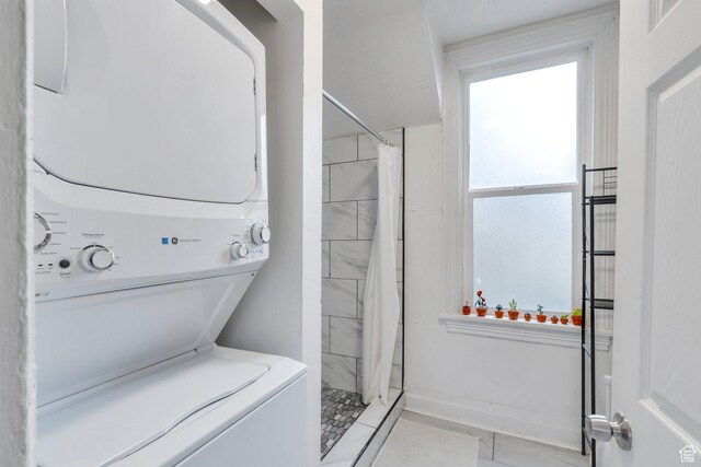 358 W 400 S, Provo, UT 84601 - full bath with stacked washing machine and dryer, a stall shower, and tile patterned floors