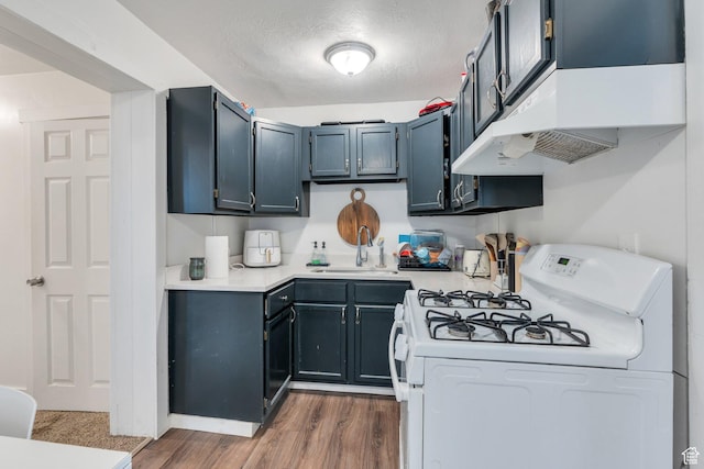 358 W 400 S, Provo, UT 84601 - kitchen featuring white gas range, a sink, light countertops, dark wood-style floors, and a textured ceiling