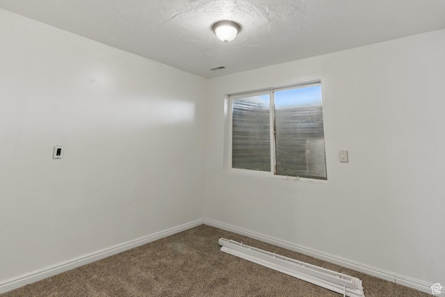 677 E 700 N, Tooele, UT 84074 - spare room featuring dark carpet and baseboards