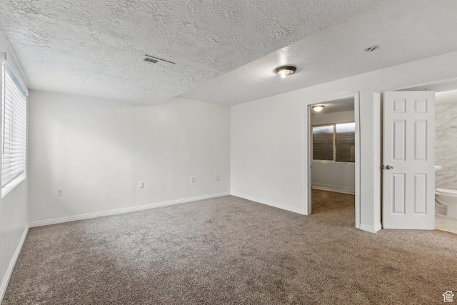 677 E 700 N, Tooele, UT 84074 - carpeted spare room featuring baseboards and a textured ceiling