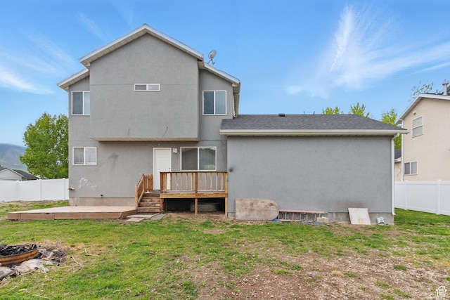 677 E 700 N, Tooele, UT 84074 - rear view of property featuring a deck and stucco siding