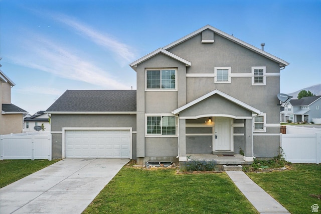 677 E 700 N, Tooele, UT 84074 - traditional-style home featuring stucco siding, an attached garage, and concrete driveway
