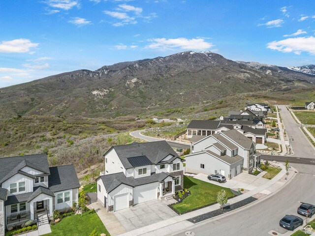 aerial view of residential area with mountains