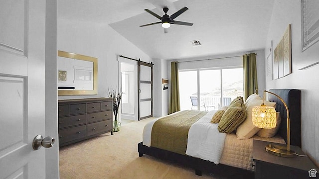 bedroom with vaulted ceiling, a barn door, access to outside, carpet, and ceiling fan