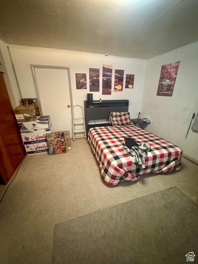 bedroom featuring carpet