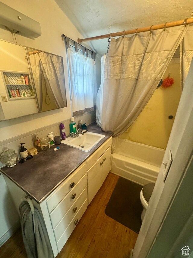 90 S 300 W, Payson, UT 84651 - full bath with wood finished floors, vanity, and shower / bath combination with curtain