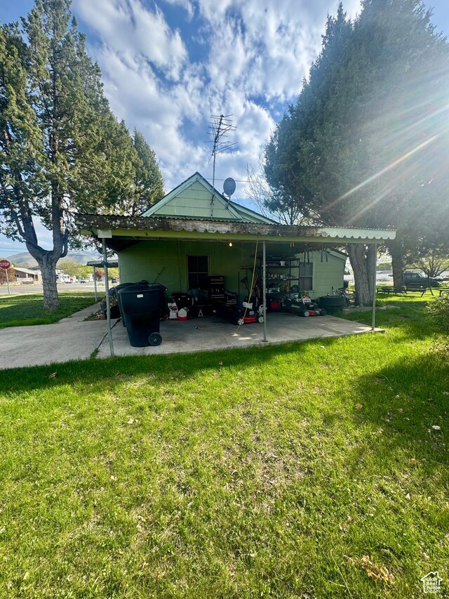 90 S 300 W, Payson, UT 84651 - back of house with a yard, a patio area, and an attached carport