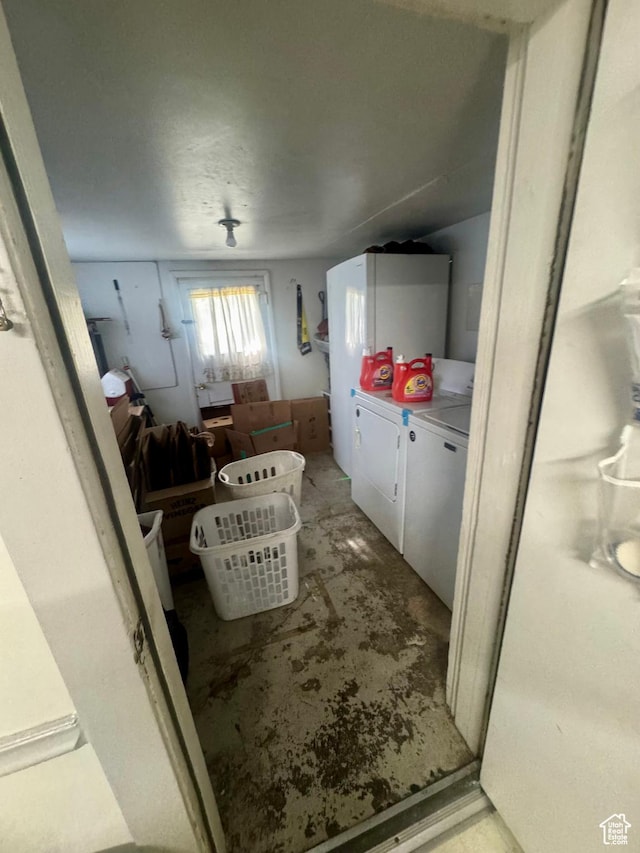 laundry room featuring separate washer and dryer