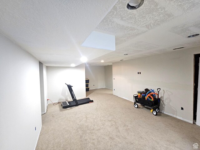 1771 E Skyline Dr Unit I4, Eagle Mountain, UT 84005 - workout room featuring carpet, a textured ceiling, and baseboards