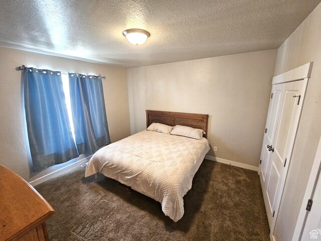 1771 E Skyline Dr Unit I4, Eagle Mountain, UT 84005 - bedroom featuring carpet flooring and a textured ceiling