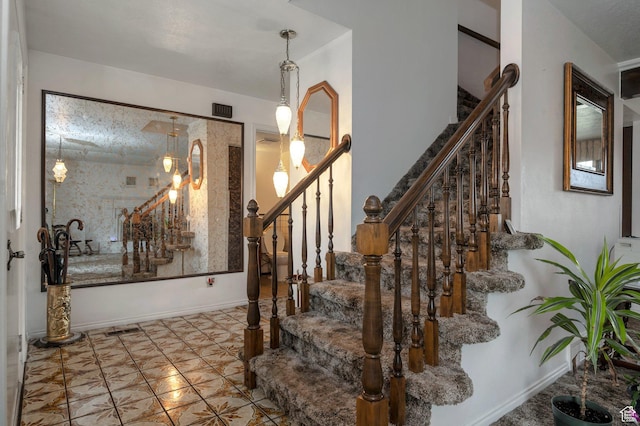 825 W Arapahoe Ave S, Salt Lake City, UT 84104 - staircase with baseboards