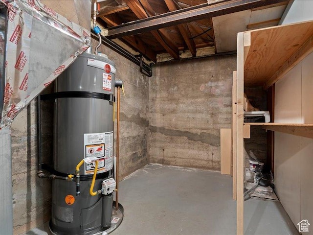 unfinished basement with water heater