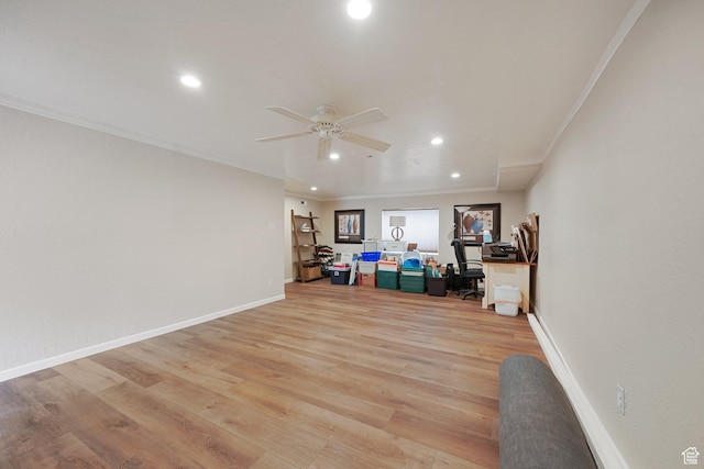 interior space featuring a desk, recessed lighting, a ceiling fan, ornamental molding, and light wood-type flooring