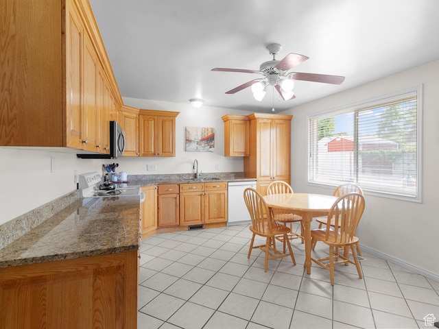 kitchen with dishwasher, a sink, stainless steel microwave, light tile patterned flooring, and ceiling fan