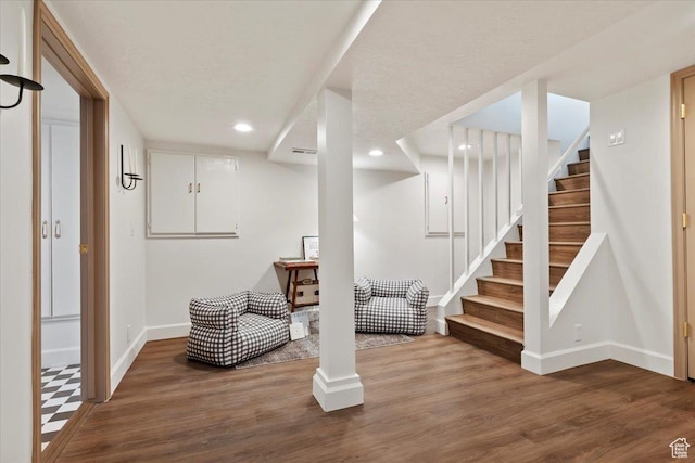 1920 E Westminster Ave, Salt Lake City, UT 84108 - finished basement with baseboards, recessed lighting, wood finished floors, and stairway