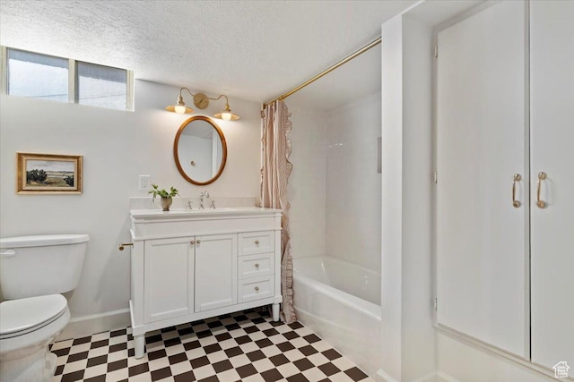 1920 E Westminster Ave, Salt Lake City, UT 84108 - full bath featuring tile patterned floors, toilet, vanity, a textured ceiling, and baseboards