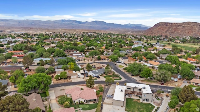 aerial perspective of suburban area featuring a mountain backdrop