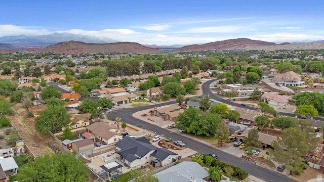 aerial perspective of suburban area with a mountainous background
